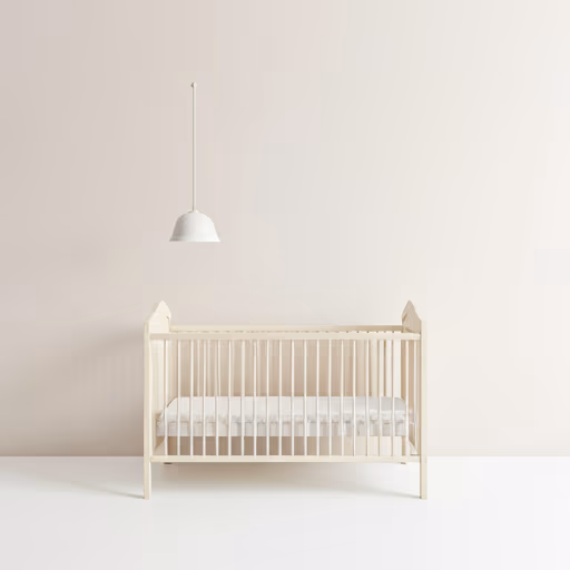 Soft focused warm interior of a modern minimalist nursery with natural wooden crib and sun streaming through linen curtains